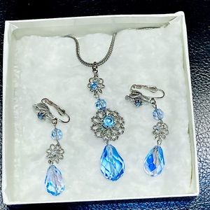 Clear blue necklace and clip earrings